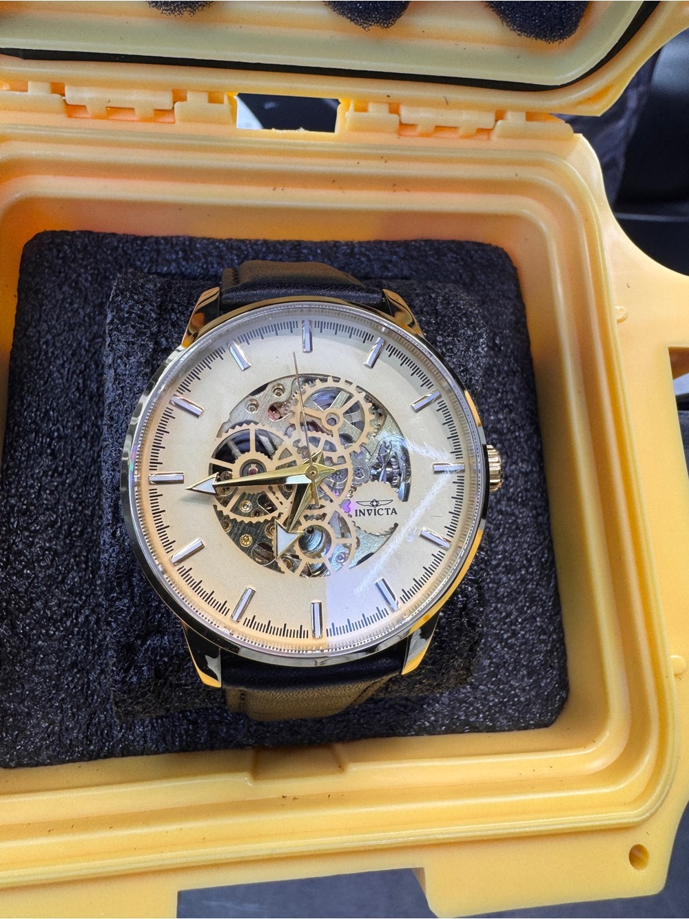Invicta Men’s Gold and Black Skeleton Dial Watch